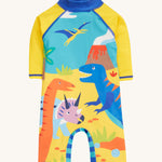 Frugi yellow little sun safe suit dino design on a cream background.