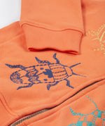 Frugi orange zip hoodie beetles design cuff detail