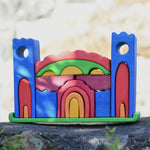 Gluckskafer blue castle block set fully set up and standing on a stone wall