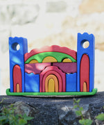 Gluckskafer blue castle block set fully set up and standing on a stone wall