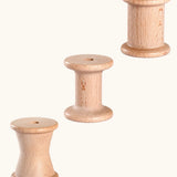 Set of 3 Grapat handcrafted wooden spools. Each spool has a different shape