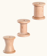 Set of 3 Grapat handcrafted wooden spools. Each spool has a different shape