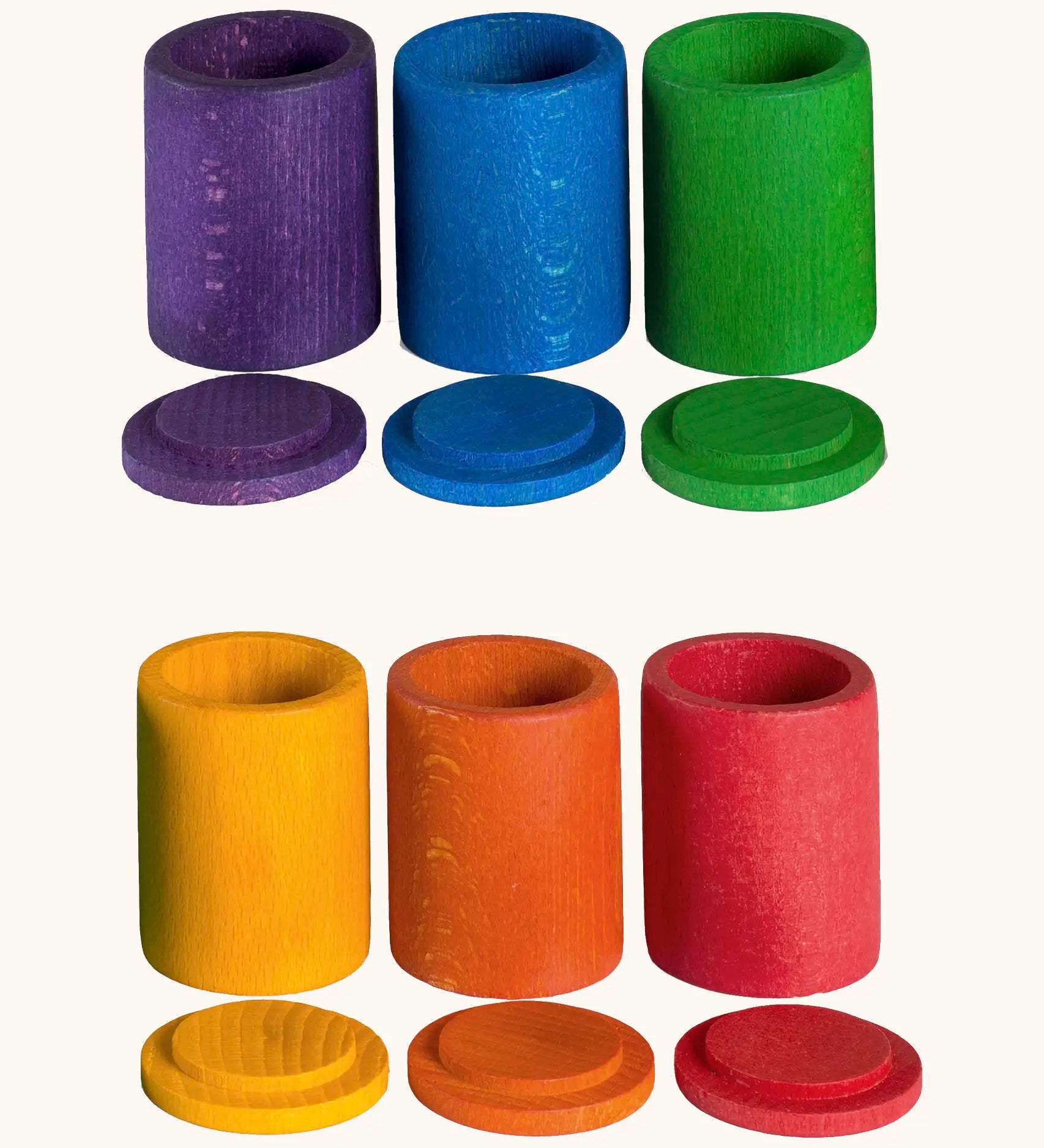 A set of 6 Grapat handcrafted wooden cups in rainbow colours with matching lids.