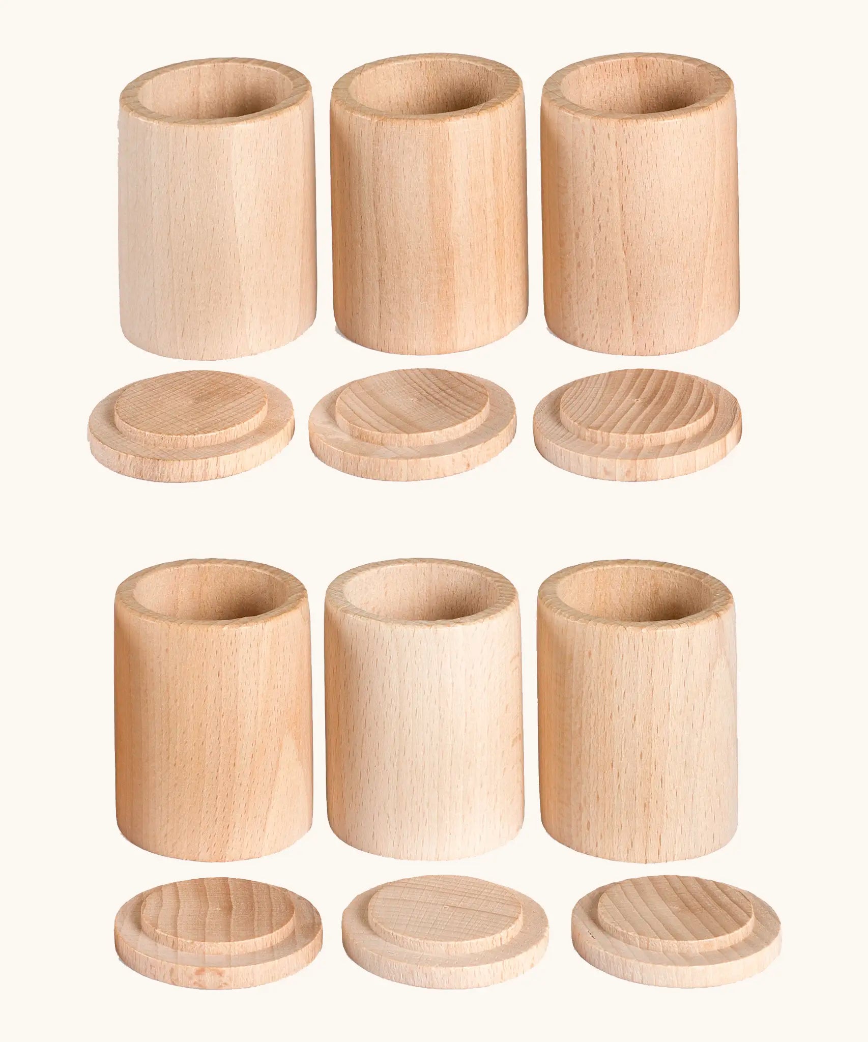 A set of 6 Grapat handcrafted unpainted wooden cups with matching lids, perfect for sorting and creative play