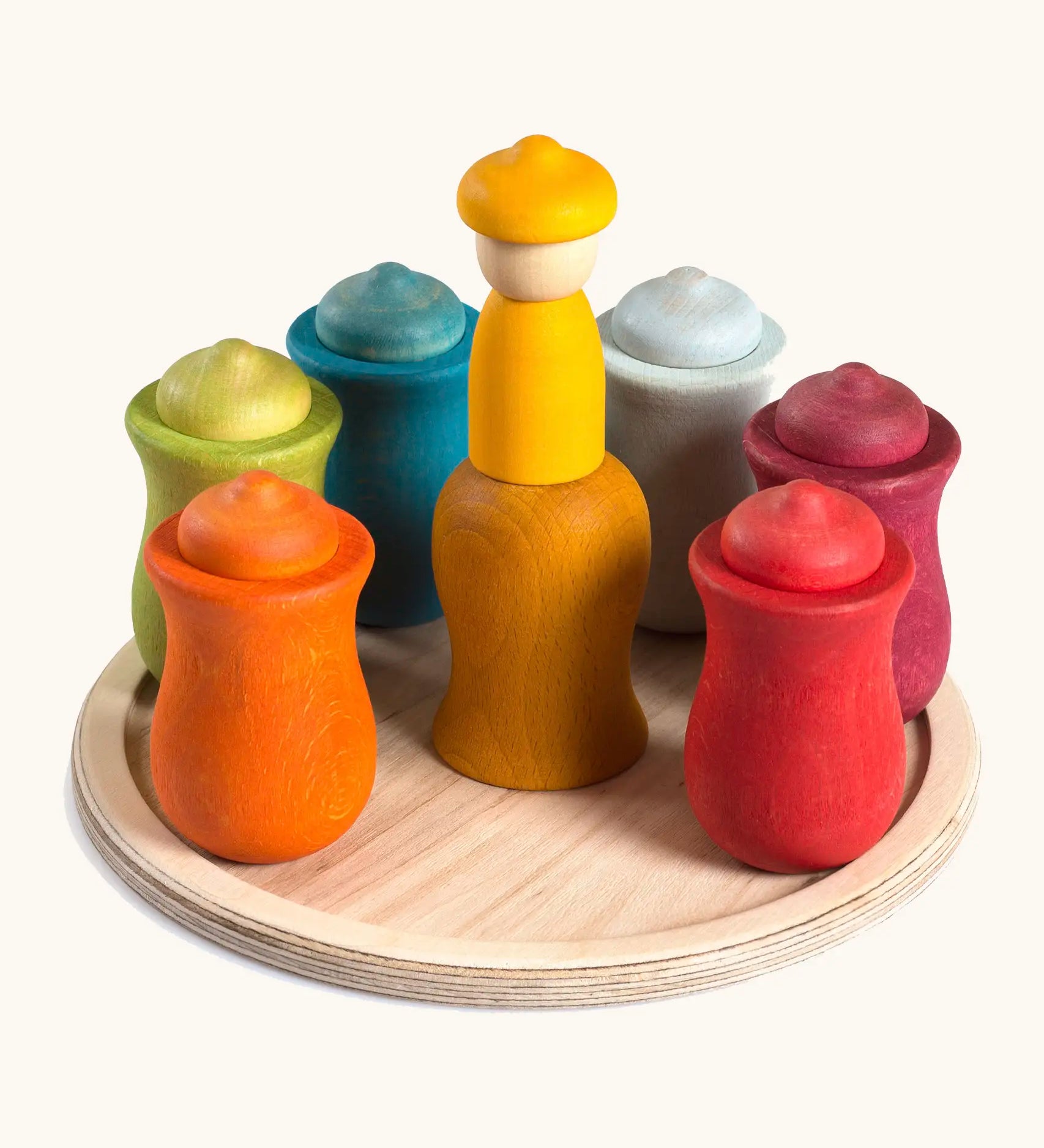 Grapat handcrafted wooden 7 moons weekly calendar set showing curved colour cups and matching peg dolls inside and wooden base