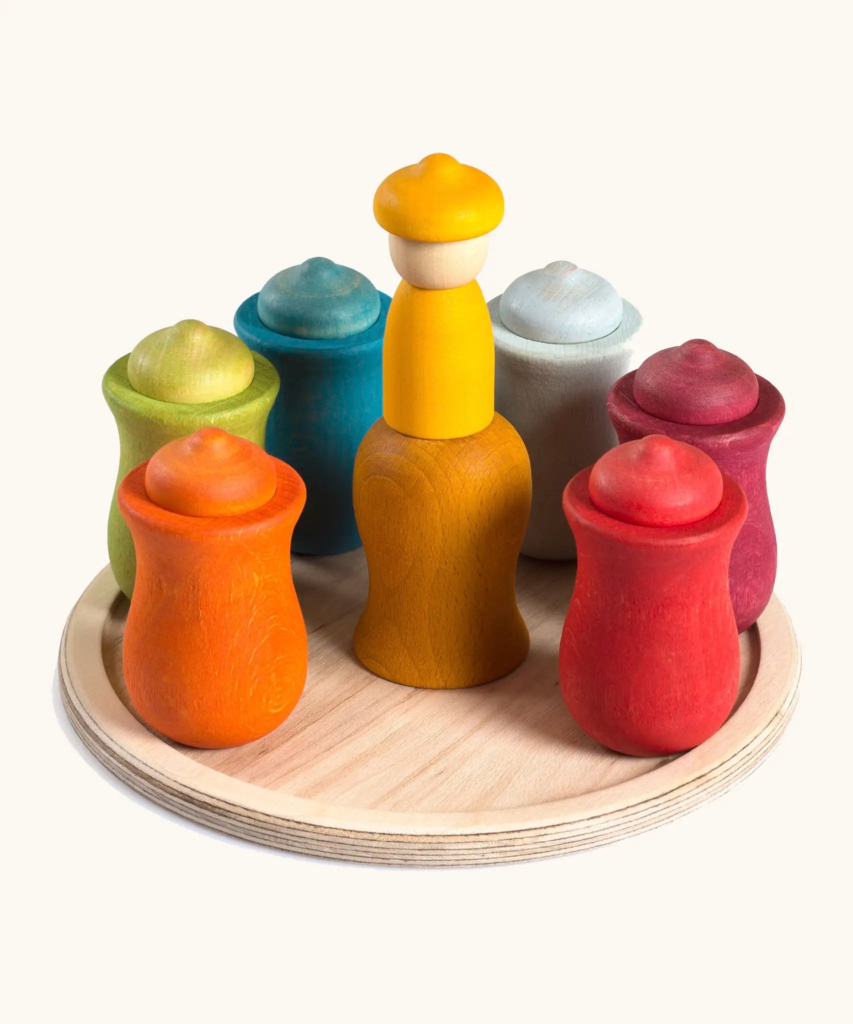 Grapat handcrafted wooden 7 moons weekly calendar set showing curved colour cups and matching peg dolls inside and wooden base