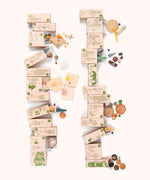 The Grapat advent calendar 2025 available at Babipur features 24 individual decorated small boxes with a matching booklet. Boxes are opened revealing the wooden contents inside