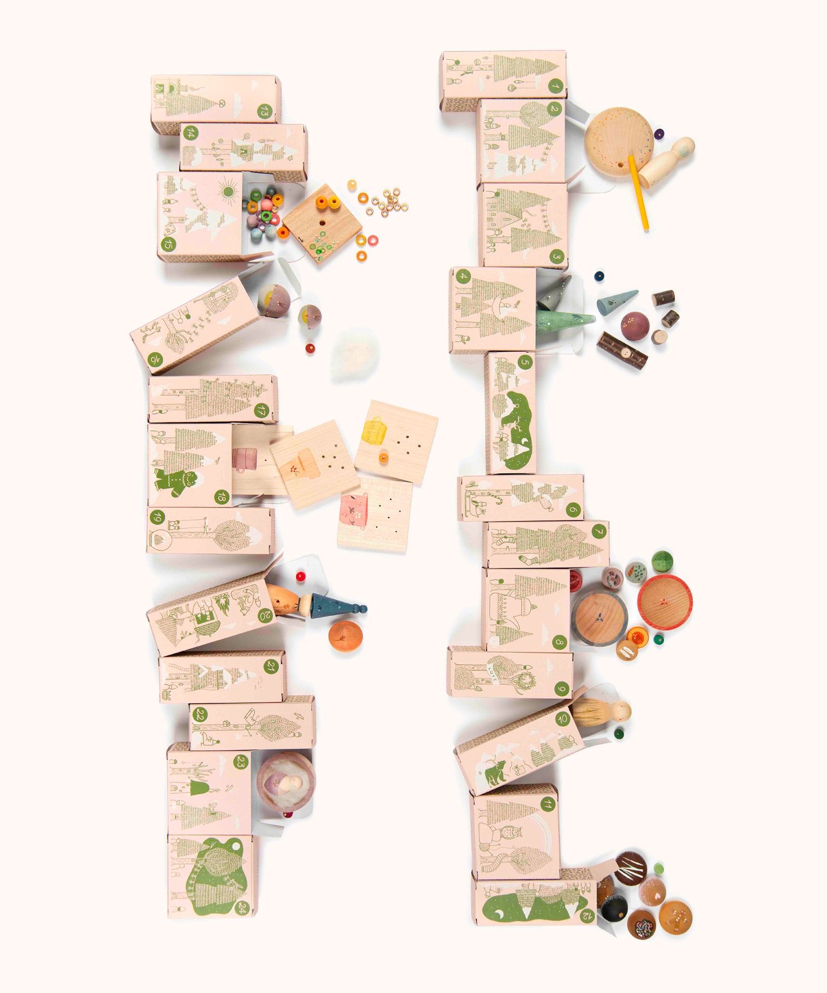 The Grapat advent calendar 2025 available at Babipur features 24 individual decorated small boxes with a matching booklet. Boxes are opened revealing the wooden contents inside