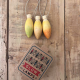 Grapat Wooden Christmas Ornaments - Glow Lamps. Beautifully hand made, and hand painted Christmas ornaments, with an heirloom quality to be used year after year. Snow Buddy consists of 3 light shaped ornaments, painted in various bright colours.