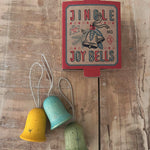 Grapat Wooden Christmas Ornaments - Jingle Joy Bells. Beautifully hand made, and hand painted Christmas ornaments, with an heirloom quality to be used year after year. Snow Buddy consists of 3 bell shaped ornaments, painted in yellow, blue and green with hand painted stars.