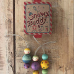 Grapat Wooden Christmas Ornaments - Snow Buddy. Beautifully hand made, and hand painted Christmas ornaments, with an heirloom quality to be used year after year. Snow Buddy consists of 3 snowman like ornaments, made from 3 round balls painted in various bright colours.