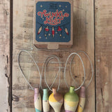 Grapat Wooden Christmas Ornaments - Twinkle Mist. Beautifully hand made, and hand painted Christmas ornaments, with an heirloom quality to be used year after year. Twinkle Mist consists of 5 bauble shaped ornaments, made from a singular piece of wood, painted in various bright colours.