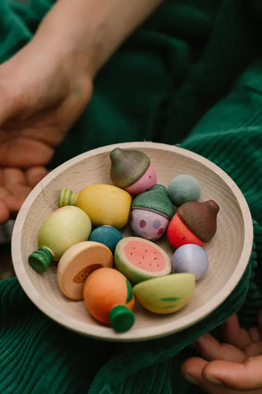 Grapat Fruits, wooden toy play food, hand-painted to resemble fruits like berries, melons, citrus fruit.