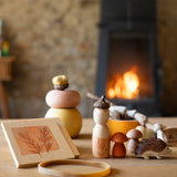 Grapat / Ostheimer hello Autumn wooden set available at Babipur. Each wooden piece is displayed in a warm cosy indoor setting