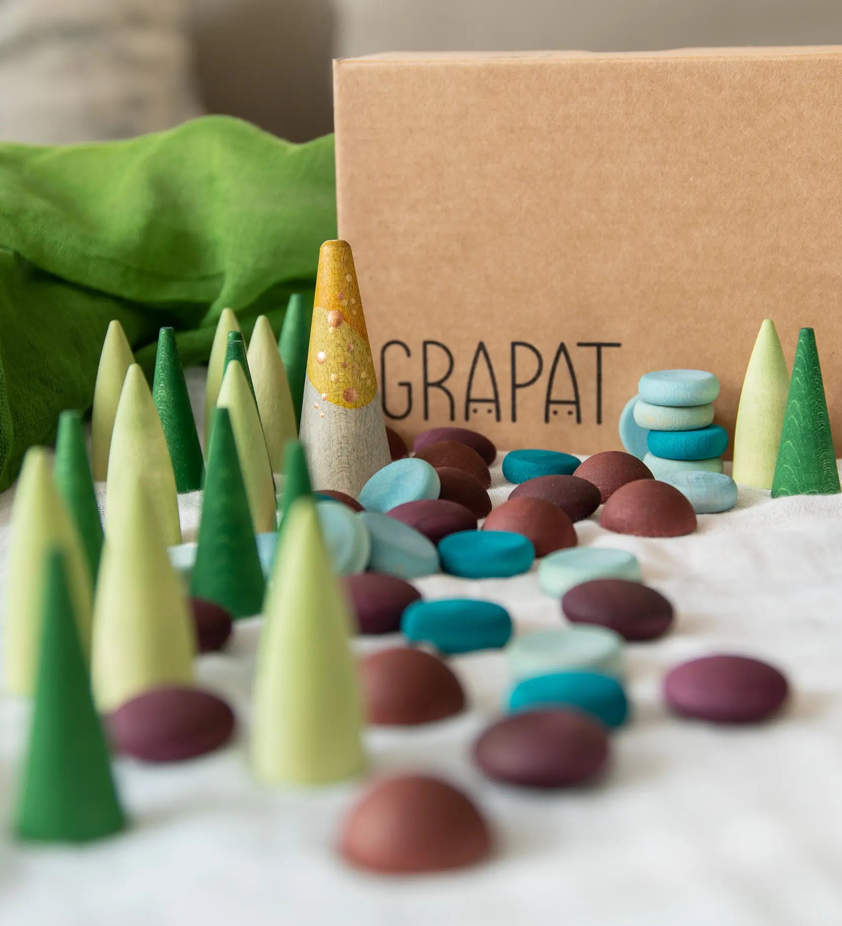 Grapat x Ostheimer Hrókur Horse Mandala Wooden Piece Set of 55 green, blue and burgundy loose parts.