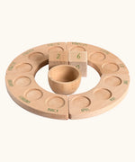 Grapat English Perpetual Calendar showing no nin peg dolls a display ring  and two day cubes and bowl