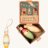 Grapat Handmade and handpainted Wooden winter sparkle decorations available at Babipur. Decorations are packaged in a winter inspired decorative  cardboard box
