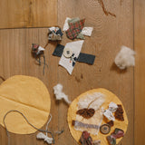 Handmade decorations made from wooden buttons pieces from the Grapat 2025 advent calendar available at Babipur