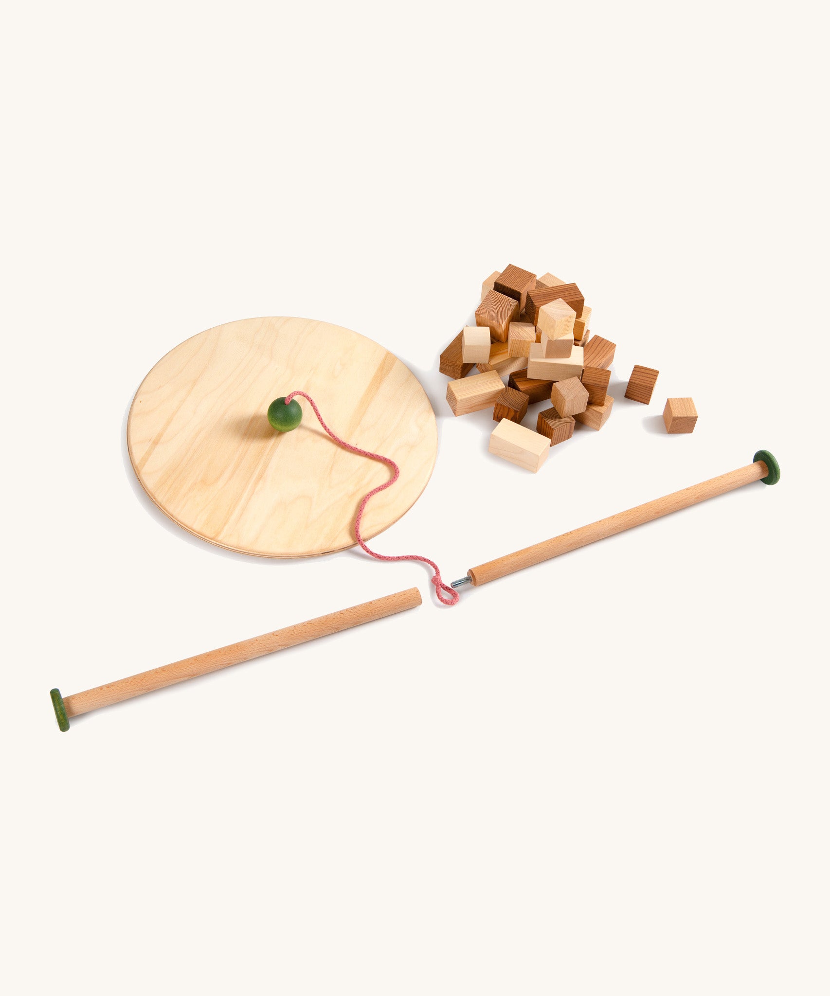 Grapat the pendlum set - handcrafted wooden pendulum. Features a wooden balancing board and wooden pole with different sized handcrafted wooden blocks next to the pendulum. Ideal for balancing games.