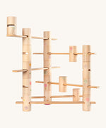 Grapat wooden woodland set - Features a combination of handcrafted and painted wooden tubes and planks  showing painted flowers, ladders and windows. Ideal for small world building and stacking games. 