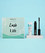 The Green People Lash & Lift Mascara Gift Set Box, with the Green  People Cleanser and Mascara next to it on a white shiny block