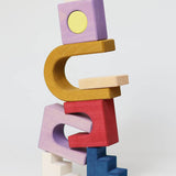 Close up of stack made from different Grimm's wooden panorama building set pieces 