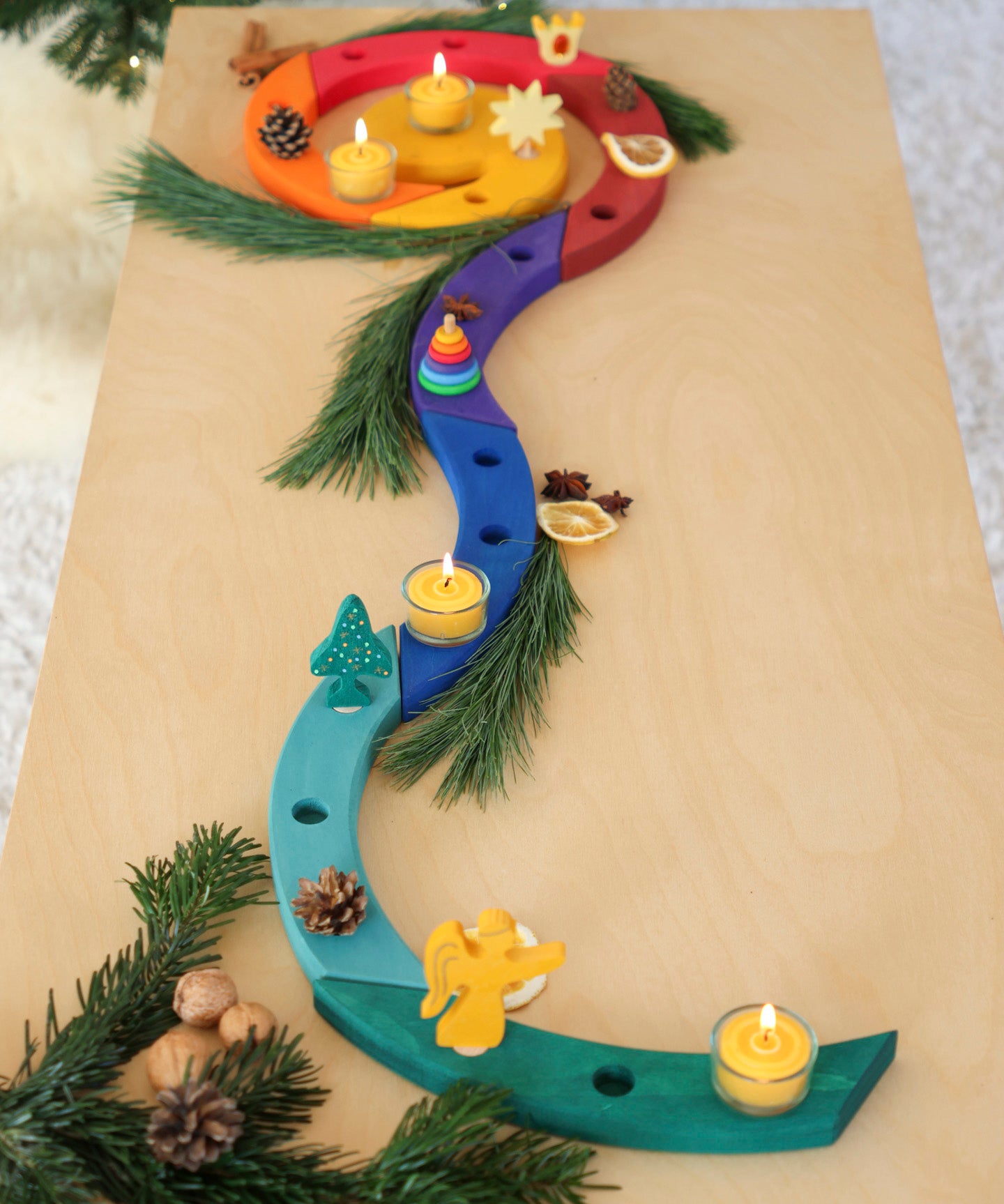 A festive inspired display using the A Grimm's Christmas Tree Celebration Ring Decoration figure available at Babipur and rainbow  celebration ring.