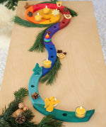 A festive inspired display using the A Grimm's Christmas Tree Celebration Ring Decoration figure available at Babipur and rainbow  celebration ring.