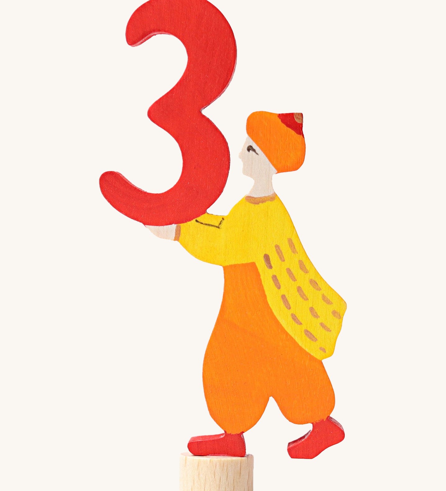 Grimms number 3 fairy decorative figure available at Babipur. A red wooden number 3 figure with a king holding the number