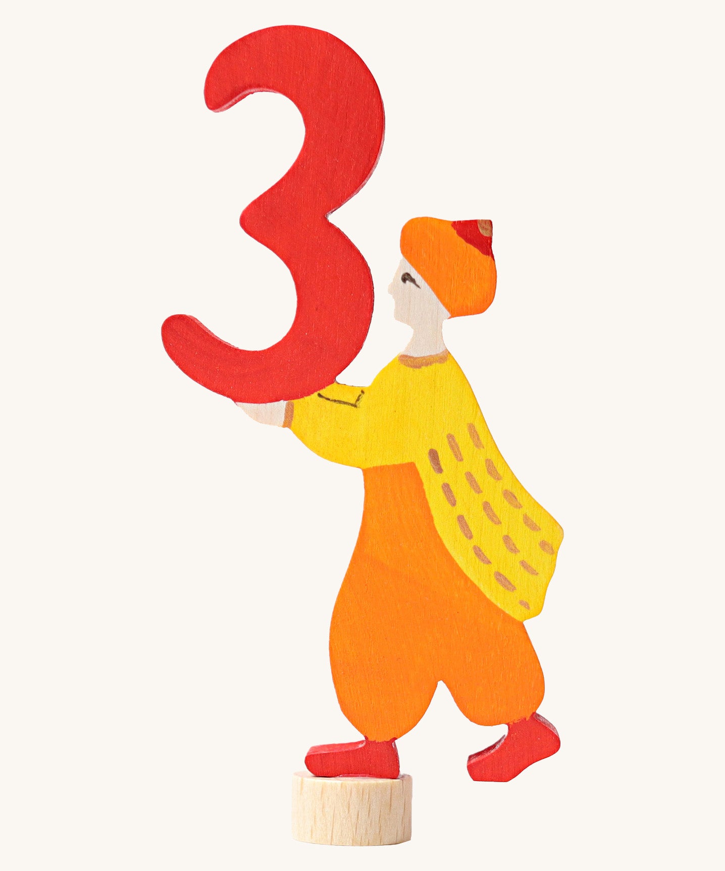 Grimms number 3 fairy decorative figure available at Babipur. A red wooden number 3 figure with a king holding the number