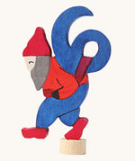 Grimms number 6 fairy decorative figure available at Babipur. A blue wooden number 6 figure on top of a red dwarf