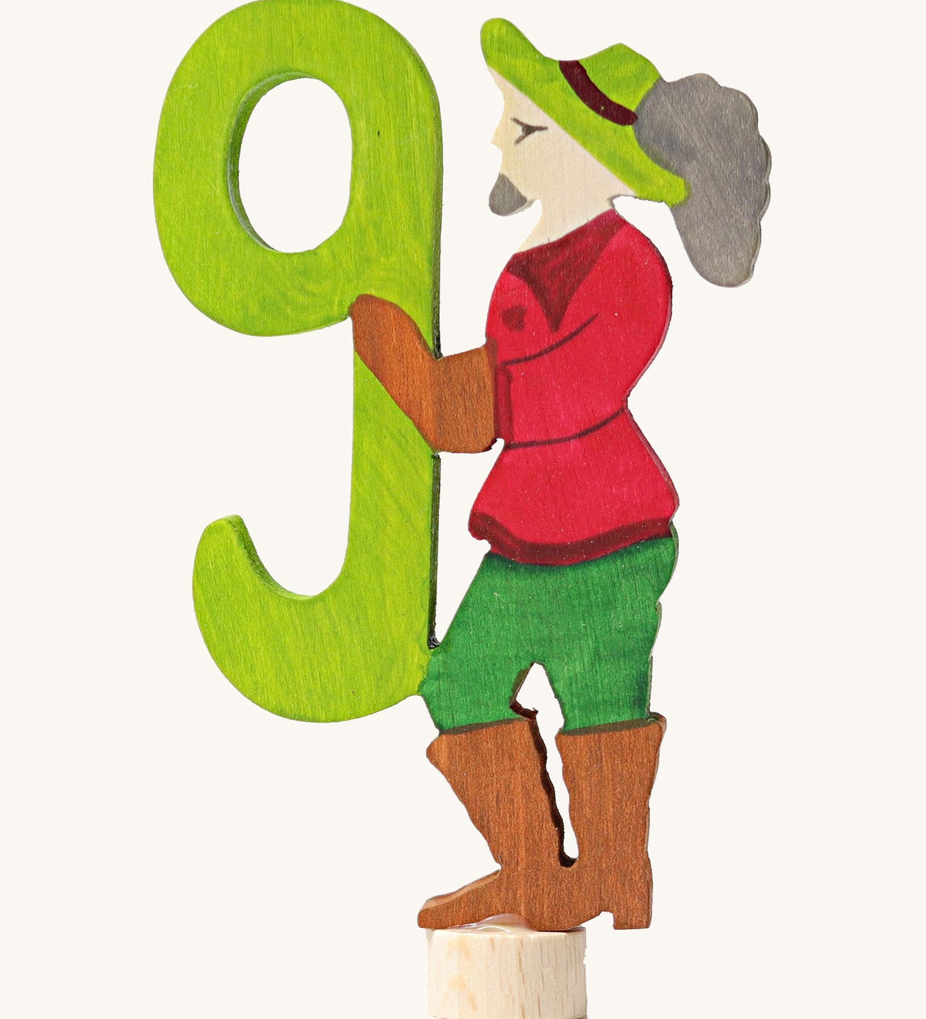 Grimms number 9 fairy decorative figure available at Babipur. A green wooden number 9 figure with fairytale person latching on.