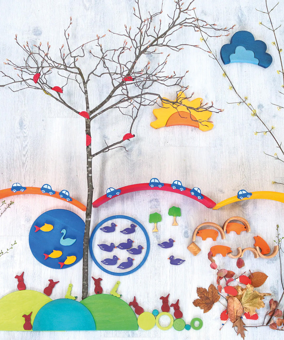 A flatlay featuring the Grimm's wooden Figures For Counting & Story Telling available at Babipur.