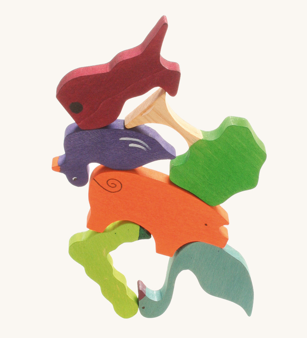 Assorted wooden figured from the Grimms figures for counting and story telling set available at Babiput.