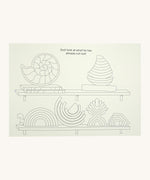 A page from the Grimms little rainbow colouring book available at Babipur showing an example page with the different rainbows and sets on a shelf