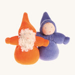 An Orange Bearded Grimm's Dwarf, and a rainbow Indigo Grimm's Dwarf next to each other on a cream background