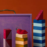 3 simple tower stacks using different handcrafted wooden Grimms pieces from the rhythm set 