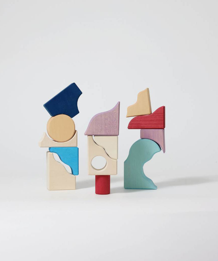 3 simple stacks using different handcrafted wooden Grimms pieces from the wave set.