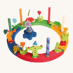 Grimm's 16-Hole Coloured Wooden Celebration Ring with candles and decorative figures
