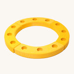 Grimm's Yellow 12-Hole Celebration Ring on a cream background. The celebration ring is made up from 4 wooden sections and has 3 small holes in each section