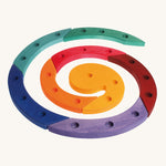 Grimm's Coloured Wooden Spiral come in 8 colourful wooden sections, each with 3 hole to put Grimm's decorative figures and candles inside. The image is on a cream background