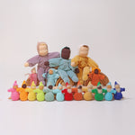 A collection of Grimm's dolls which includes the Grimm's Rainbow Dwarfs, Grimm's Pastel Dwarfs, Grimm's Viola doll, Grimm's Aqua doll, Grimm's Lavender Doll Sun, Grimm's Lavender Doll Aqua, Grimm's Yellow Soft Body Doll,
