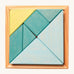 A wooden Tangram puzzle in shades of blue and green sits inside a small light wooden base on a cream background. There are 7 puzzle pieces in different shapes.