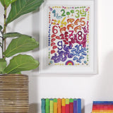 Grimm’s World of Numbers Art Print displayed above a matching counting stack game and counting pyramid