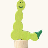 Grimm's handcrafted wooden worm decorative figure in green with unpainted stand
