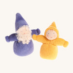 A purple Bearded Grimm's Dwarf, and a rainbow Yellow Grimm's Dwarf next to each other on a cream background