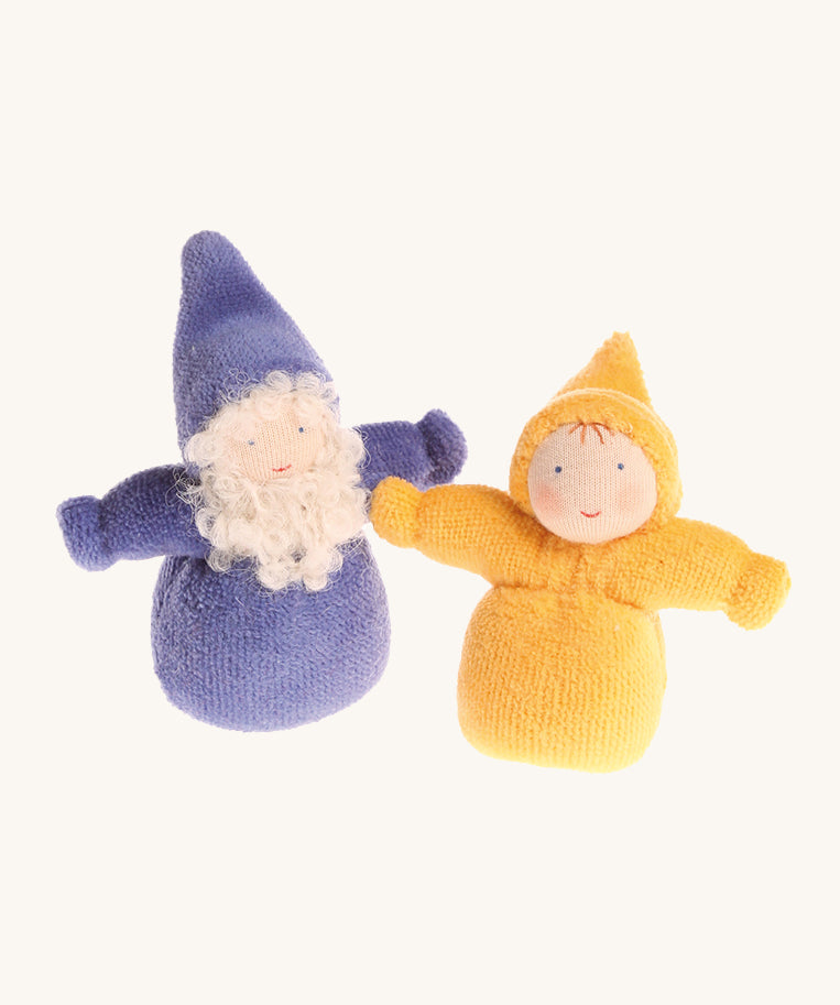A purple Bearded Grimm's Dwarf, and a rainbow Yellow Grimm's Dwarf next to each other on a cream background