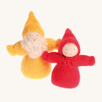 A Yellow Bearded Grimm's Dwarf, and a rainbow Red Grimm's Dwarf next to each other on a cream background