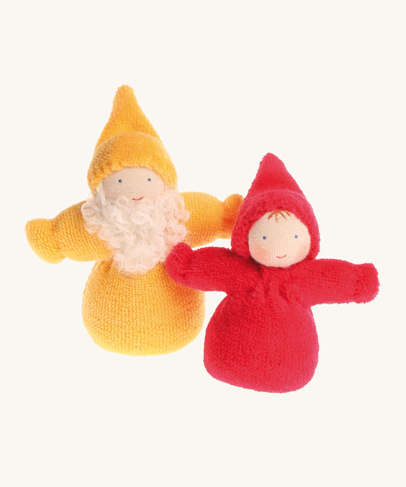 A Yellow Bearded Grimm's Dwarf, and a rainbow Red Grimm's Dwarf next to each other on a cream background
