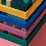 Close up of all Grimms building sets stacked on top of each other shows frame corner detail